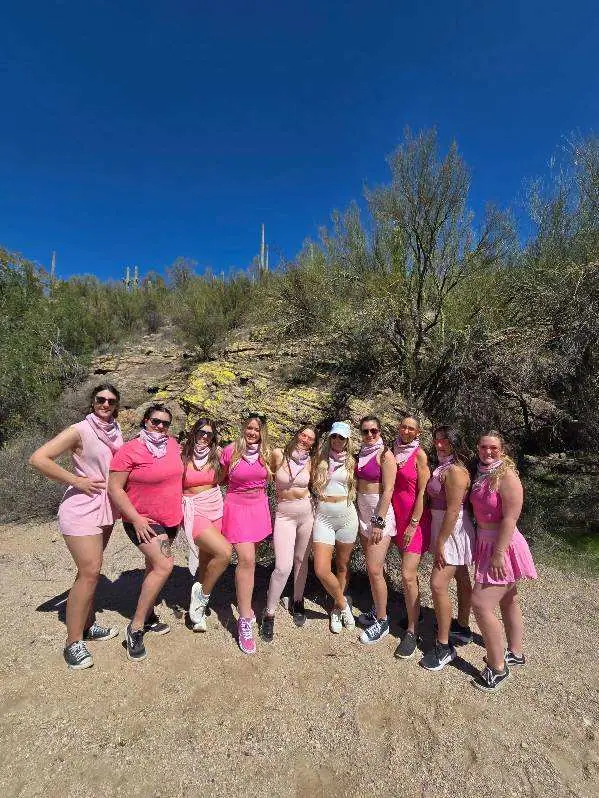 A bachelorette party in pink outfits in the Scottsdale desert