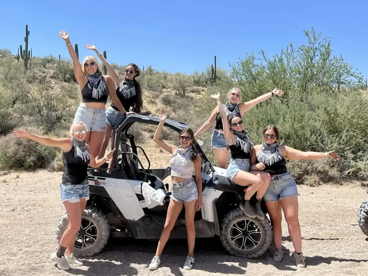 Bachelorette party riding sand buggies in the Scottsdale desert
