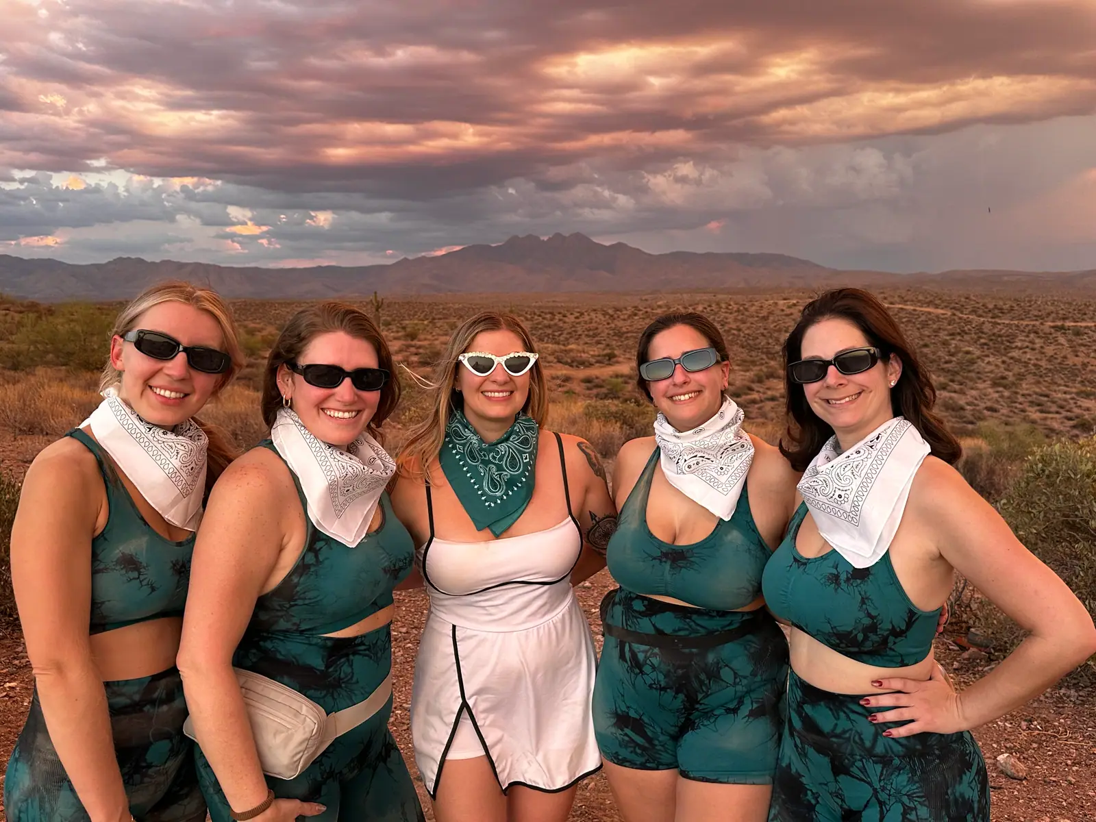 A bridal party in bandanas at sunset in the Sonoran Desert