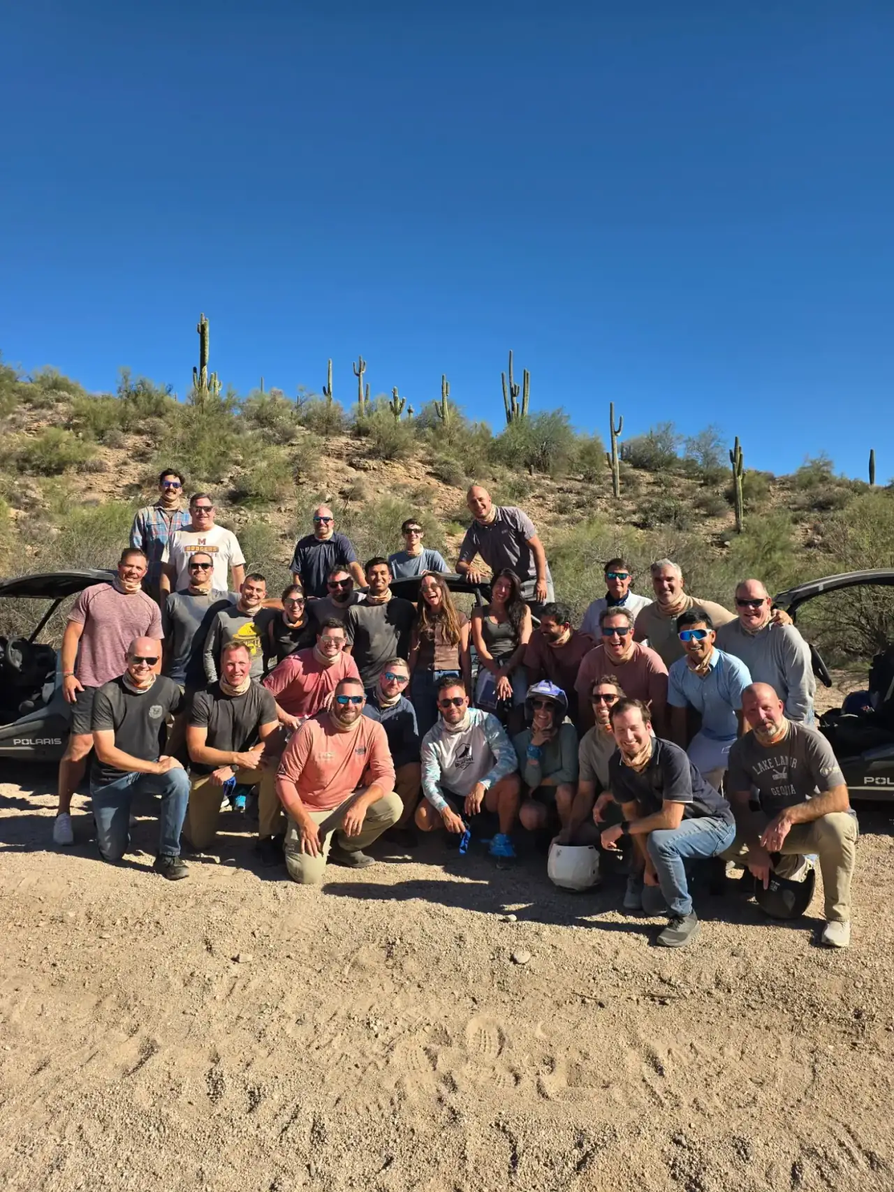 Corporate team building among the saguaros near Scottsdale