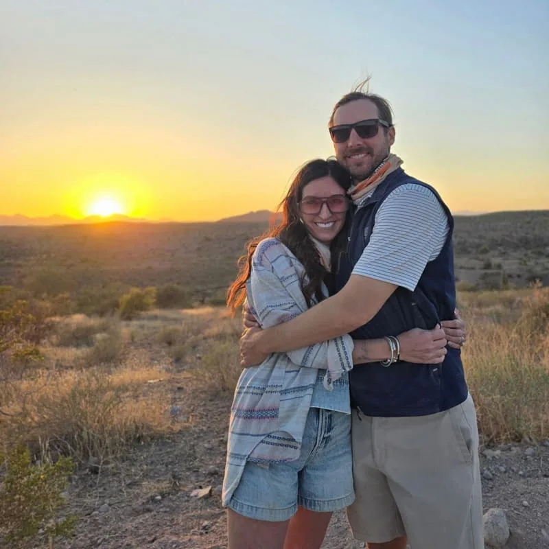 Couple posing together at sunset in the Sonoran Desert
