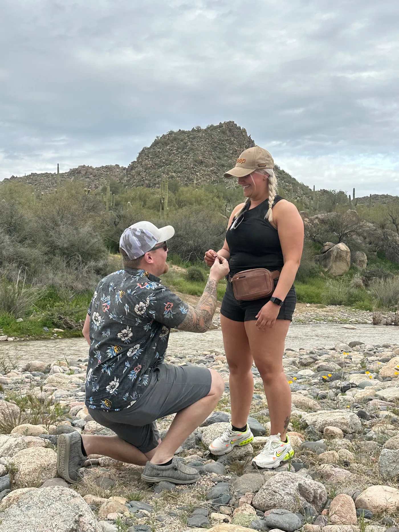 A marriage proposal in a Sonoran Desert wash during a Scottsdale off-road tour