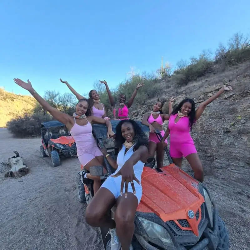 Bachelorette group on a desert rock