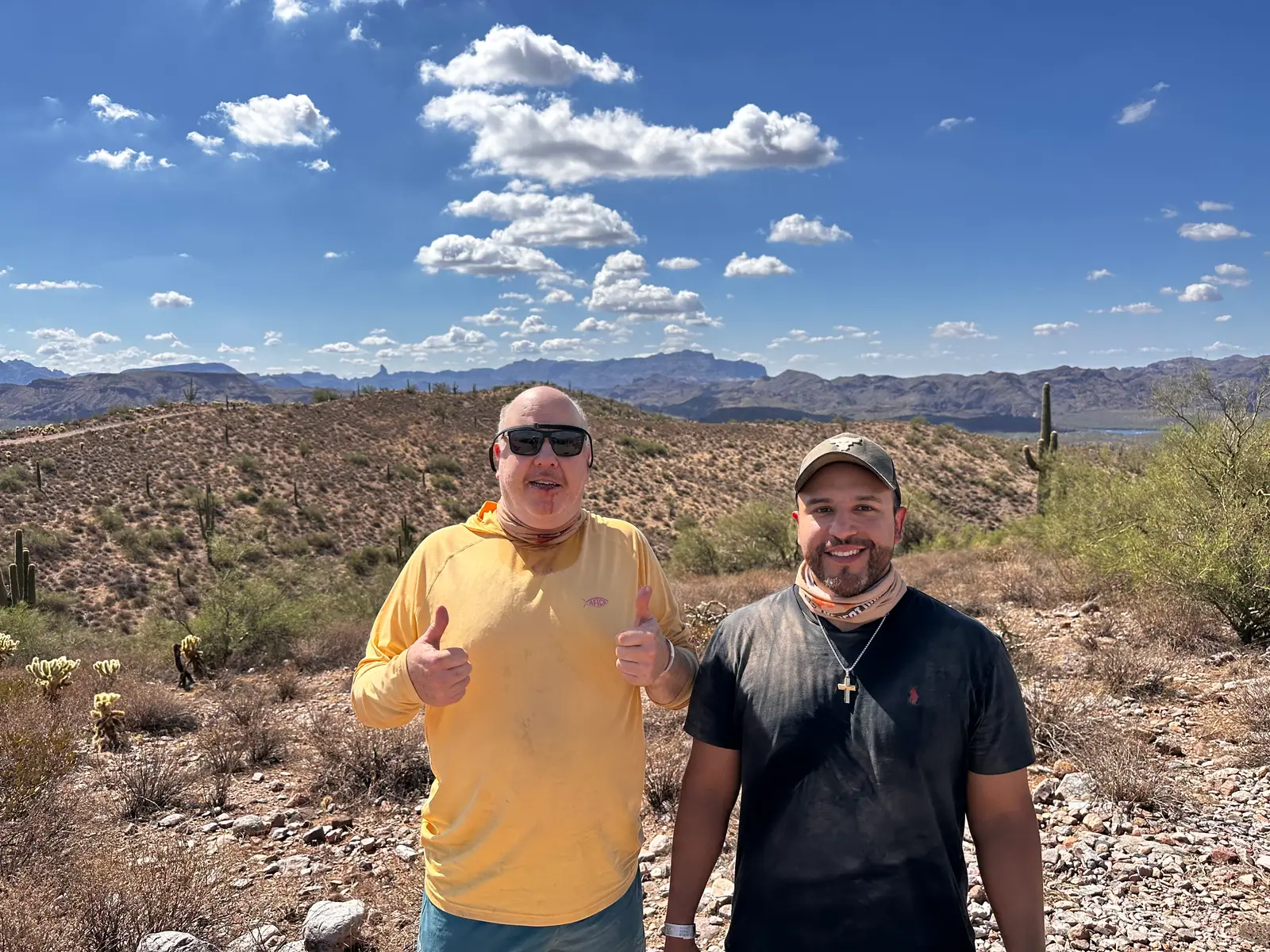 Friends giving a thumbs up at a desert vista near Scottsdale