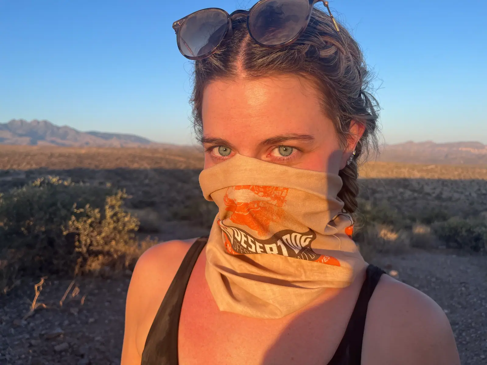 Desert Dog guide in branded gear at golden hour in the Sonoran Desert